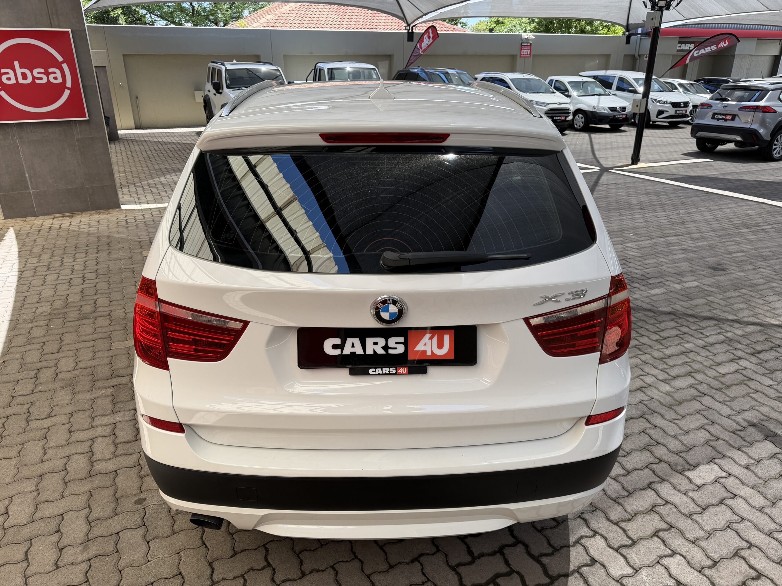 2011 BMW X3 xDrive20d Exclusive — Rear ¾